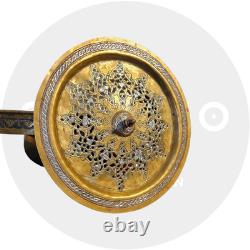 Ottoman basin in chased brass, inlaid with silver and copper Syria, late 19th century