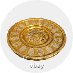 Ottoman basin in chased brass, inlaid with silver and copper Syria, late 19th century