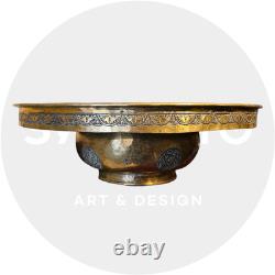 Ottoman basin in chased brass, inlaid with silver and copper Syria, late 19th century