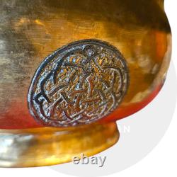 Ottoman basin in chased brass, inlaid with silver and copper Syria, late 19th century