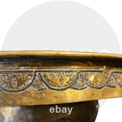 Ottoman basin in chased brass, inlaid with silver and copper Syria, late 19th century