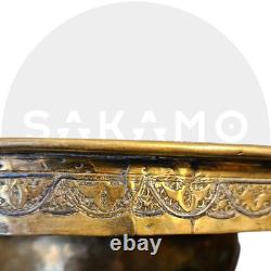 Ottoman basin in chased brass, inlaid with silver and copper Syria, late 19th century
