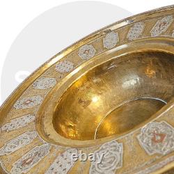 Ottoman basin in chased brass, inlaid with silver and copper Syria, late 19th century