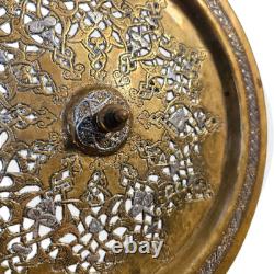 Ottoman basin in chased brass, inlaid with silver and copper Syria, late 19th century