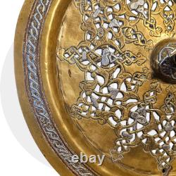 Ottoman basin in chased brass, inlaid with silver and copper Syria, late 19th century
