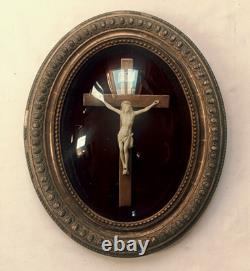Oval gilded religious frame, Napoleon III, with curved blown glass, 44 x 35 cm