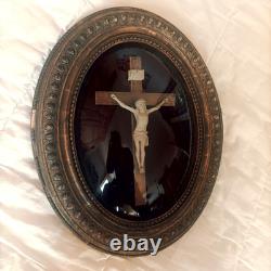Oval gilded religious frame, Napoleon III, with curved blown glass, 44 x 35 cm