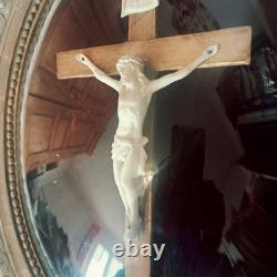 Oval gilded religious frame, Napoleon III, with curved blown glass, 44 x 35 cm