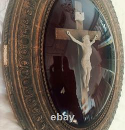 Oval gilded religious frame, Napoleon III, with curved blown glass, 44 x 35 cm