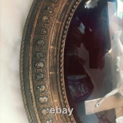 Oval gilded religious frame, Napoleon III, with curved blown glass, 44 x 35 cm