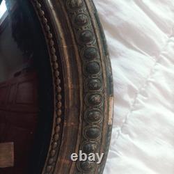 Oval gilded religious frame, Napoleon III, with curved blown glass, 44 x 35 cm