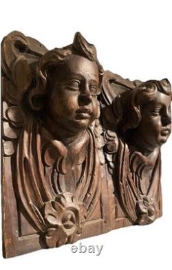 Pair of antique oak bas-reliefs, carved wooden panel, late 18th century putti