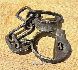 Pair of forged iron shackles from the 18th century