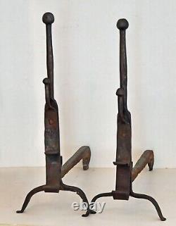 Pair of very old wrought iron andirons. Roasting spit holders.