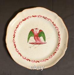 Plate in faience from the Islettes, Empire period with bird decoration