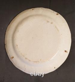 Plate in faience from the Islettes, Empire period with bird decoration