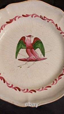 Plate in faience from the Islettes, Empire period with bird decoration