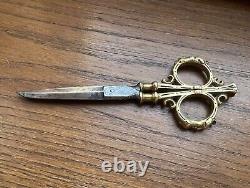 Rare antique pair of scissors from around 1850 with bearded face steel and bronze