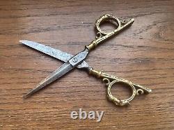 Rare antique pair of scissors from around 1850 with bearded face steel and bronze