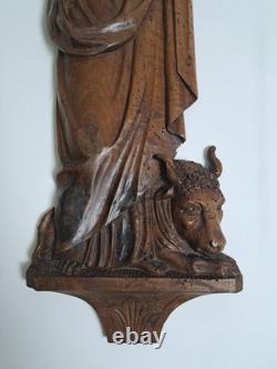 Saint Luke, Evangelist, applied sculpture in walnut, late 17th/early 18th century