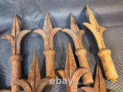 Set of 13 old wrought iron gate spikes with fleur de lys decoration