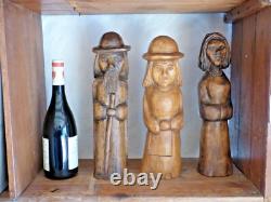 Set of 3 wooden sculptures representing a family, folk art, 35 cm, signed
