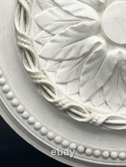 Stucco ceiling rose with floral and beaded decoration, 19th century style