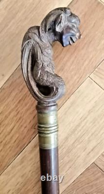 Superb antique mahogany cane with a beautiful carved knob, 19th century faun decoration