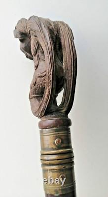 Superb antique mahogany cane with a beautiful carved knob, 19th century faun decoration