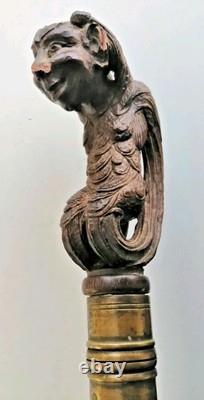 Superb antique mahogany cane with a beautiful carved knob, 19th century faun decoration