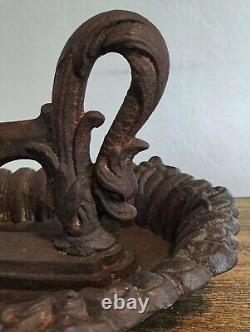 Superb cast iron boot scraper, 19th century Dolphin design