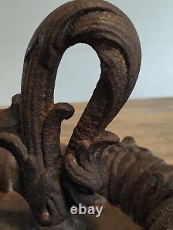 Superb cast iron boot scraper, 19th century Dolphin design