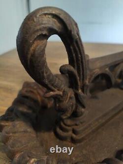 Superb cast iron boot scraper, 19th century Dolphin design