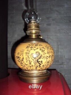 Superb vintage Stella Brenner kerosene lamp, ceramic decoration, cherub angel
