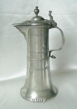 Translation: BEAUTIFUL and LARGE PITCHER, 18th-century CONICAL SHAPE, made of TIN with FLARED BASE.