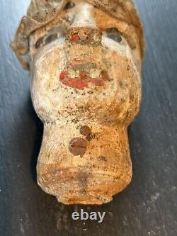 Translation: 'Head of an Ancient Marionette: Carved and Polychrome Wooden Guignol from the 19th Century'