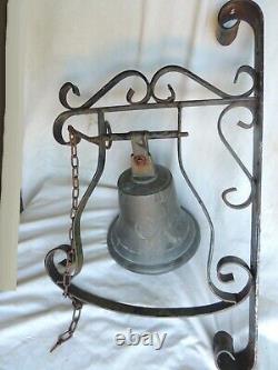 Translation: 'Old Large Bronze Wall Bell 1916 of Ownership'