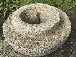 Upper part of an ancient stone salt mill (lying fox)