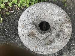 Upper part of an ancient stone salt mill (lying fox)