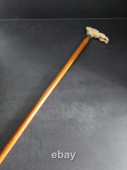 Walking stick / 19th-century corkscrew depicting a fleeing hare