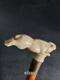 Walking stick / 19th-century corkscrew depicting a fleeing hare