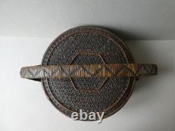 Woven bamboo and rattan basket with handle, 19th century