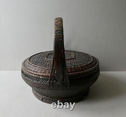 Woven bamboo and rattan basket with handle, 19th century