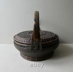 Woven bamboo and rattan basket with handle, 19th century