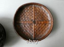 Woven bamboo and rattan basket with handle, 19th century
