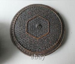 Woven bamboo and rattan basket with handle, 19th century