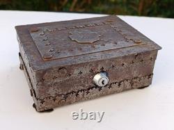 Wrought iron box, antique coat of arms, heavy metal chest with lock and key, Gothic iron box
