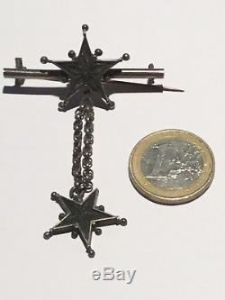 Ancienne broche en argent avec 2 grandes étoiles de Digne pentacrine St Vincent