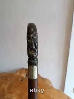 Ancienne canne de marche Pommeau en ébène sculpté