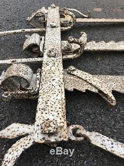 Ancienne crémaillère cheminée fer forgé zoomorphe outil ancien art populaire